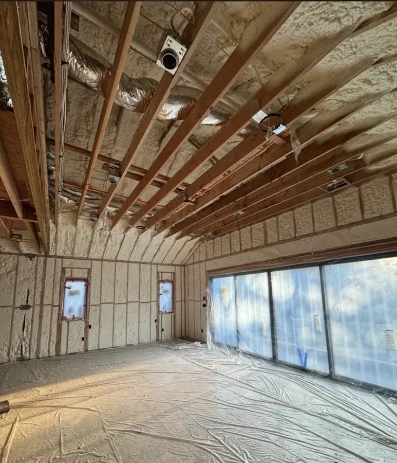 Interior walls and ceiling insulated with spray foam during new construction in Searcy